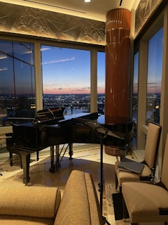 Piano in front of New York City skyline